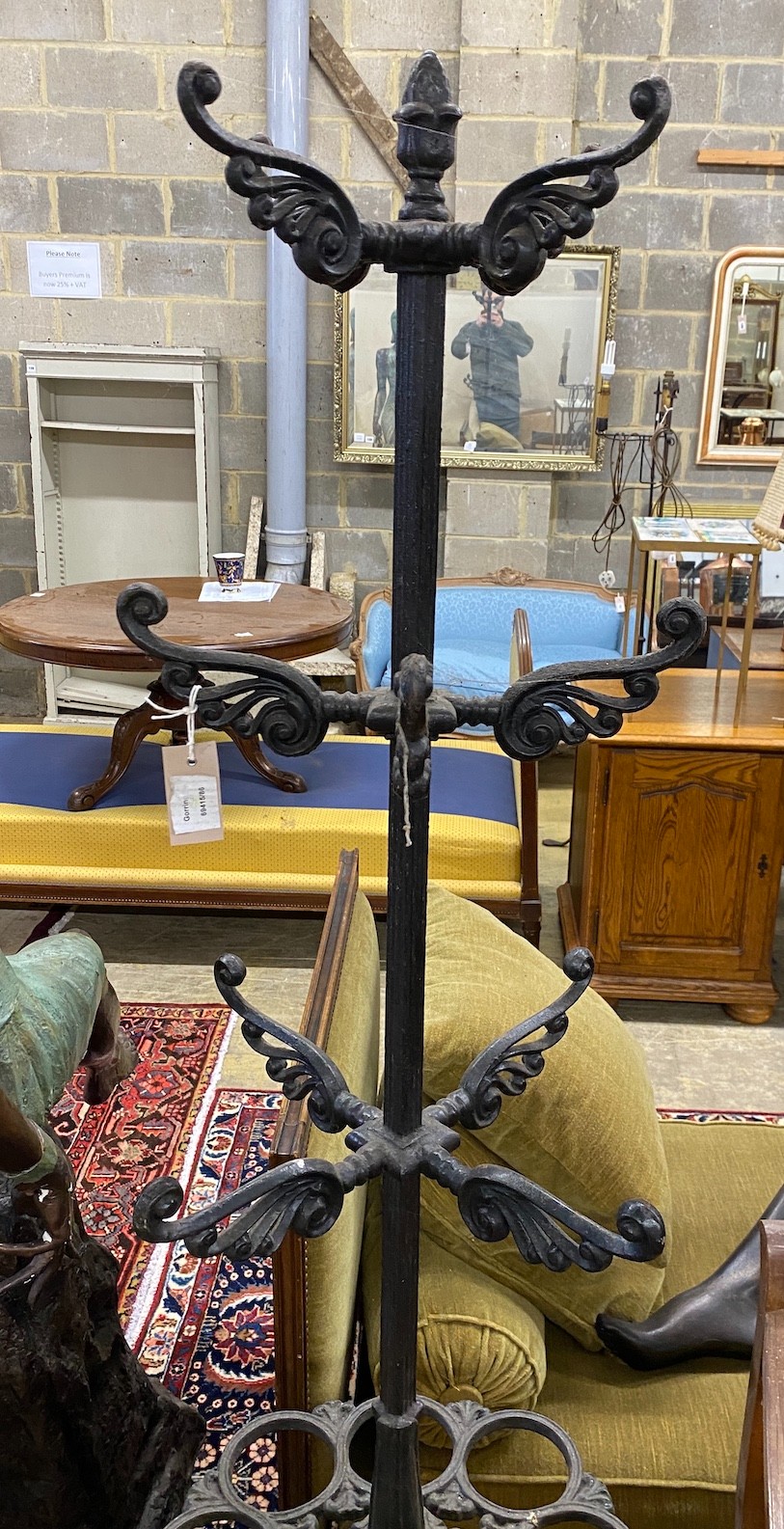 A Victorian style painted cast iron coat and stick stand, height 182cm